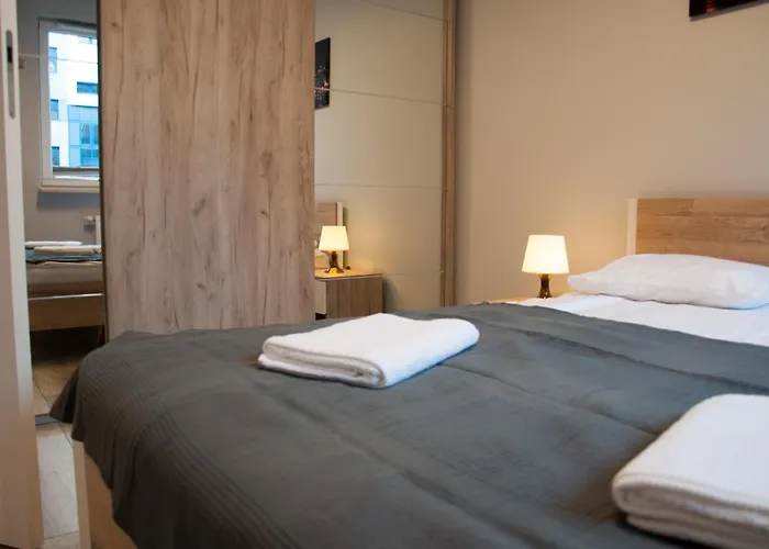 Апартаменты Cybernetyki Mokotow *